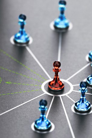 A network of connecting chess pieces, representing a strategic marketing approach